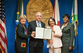 From left to right: Miami-Dade County Commissioner Sally A. Heyman, District 4; Miami-Dade County Mayor Carlos A. Gimenez, South Africa’s City of Cape Town Executive Mayor Patricia De Lille; Miami-Dade County Commissioner Audrey M. Edmonson, District 3